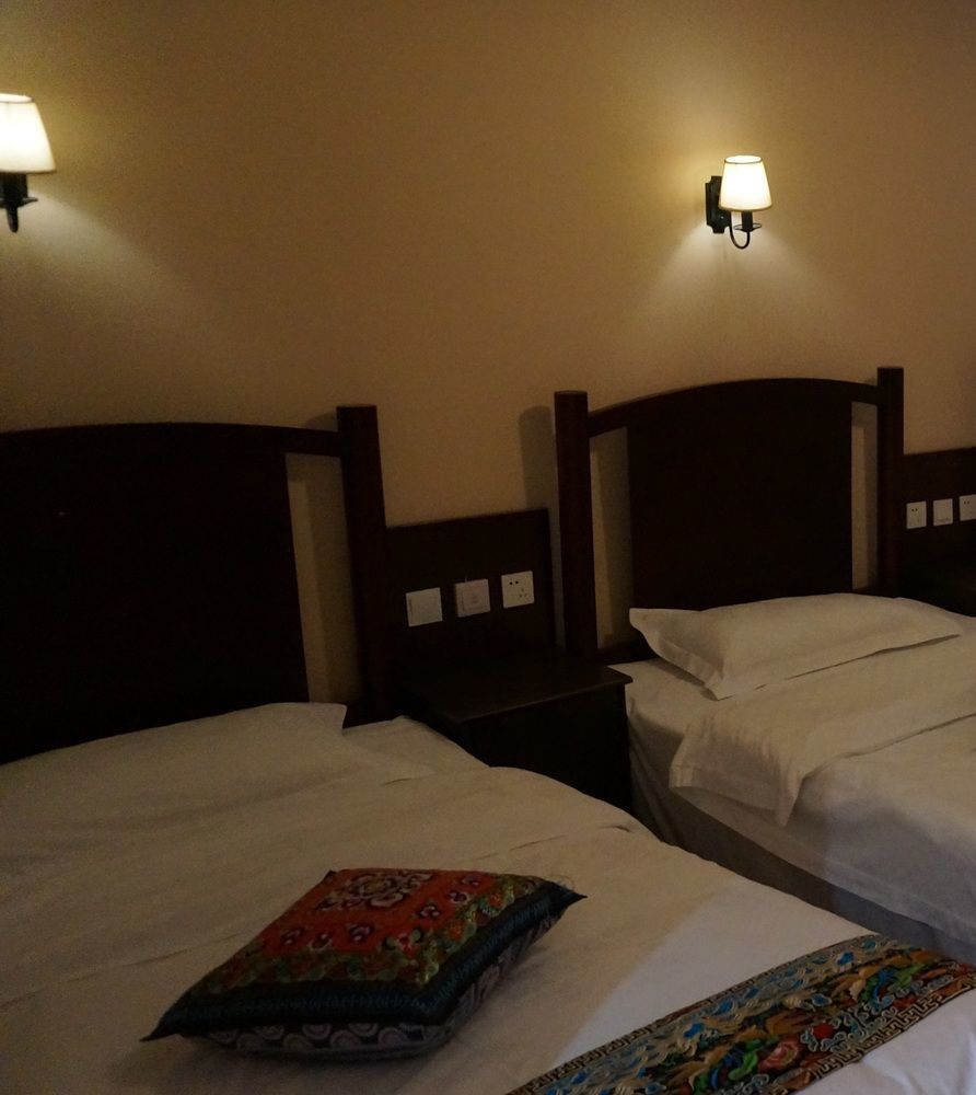 Wo Home Hostel Jiuzhaigou Bagian luar foto