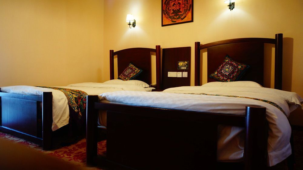 Wo Home Hostel Jiuzhaigou Bagian luar foto