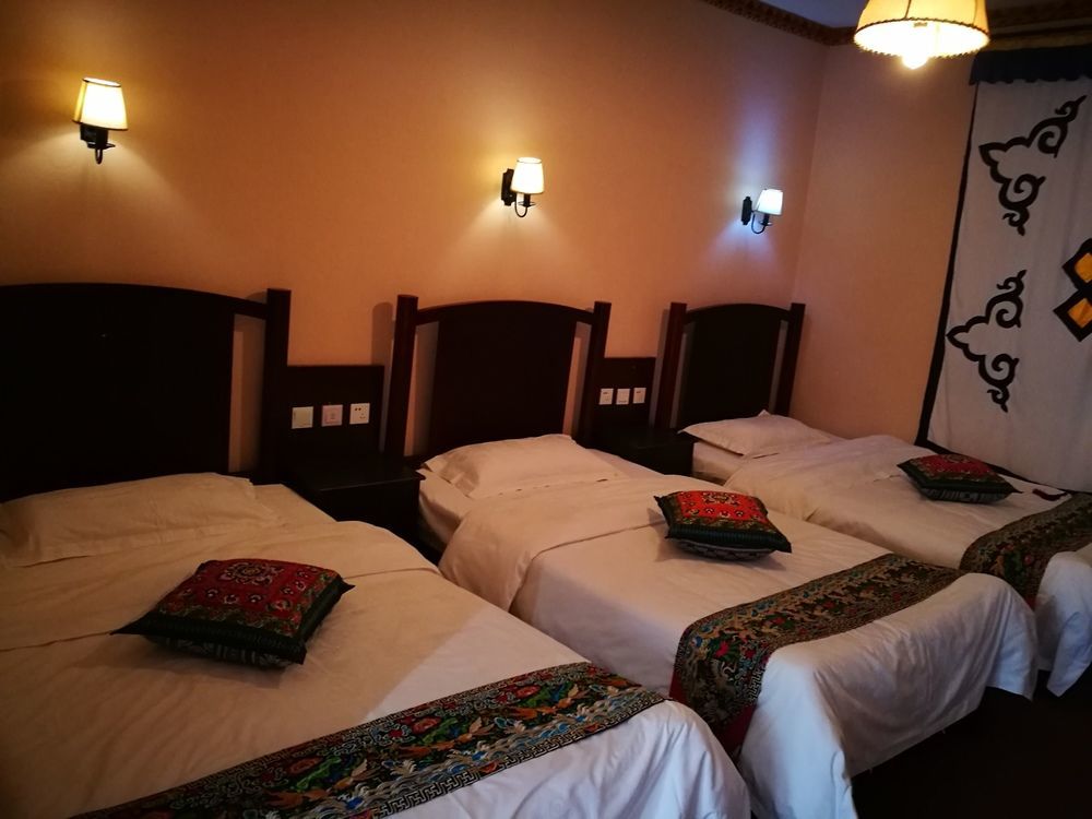 Wo Home Hostel Jiuzhaigou Bagian luar foto