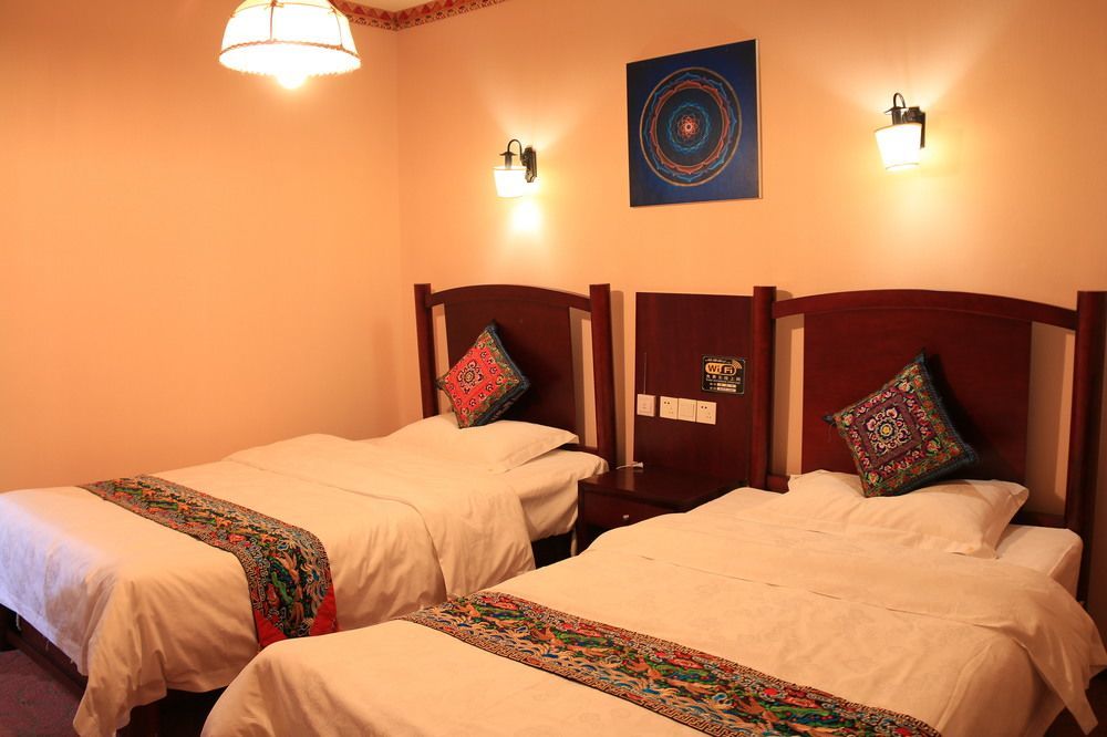 Wo Home Hostel Jiuzhaigou Bagian luar foto